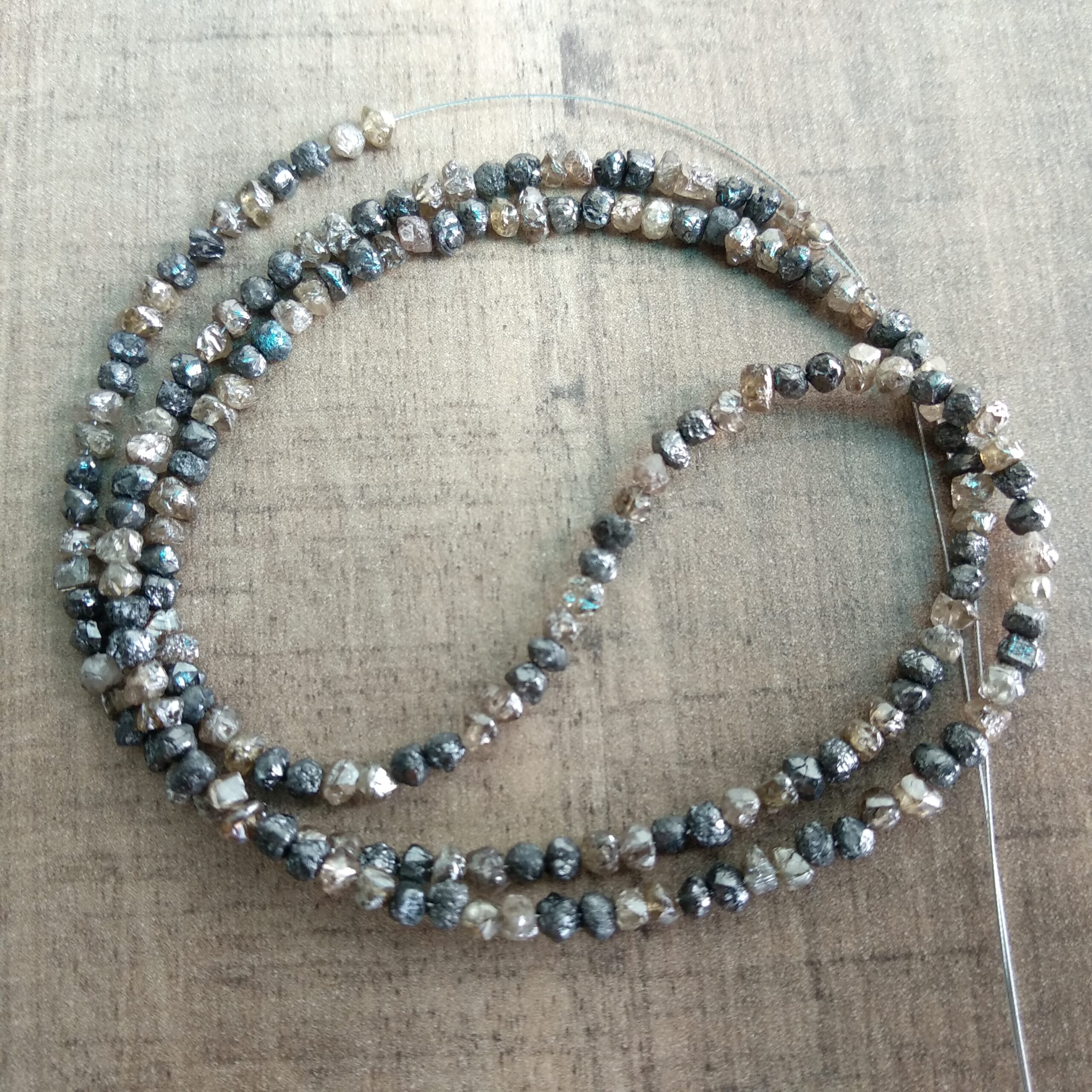Brow and black diamond beads