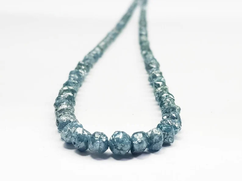 Polished blue diamond beads